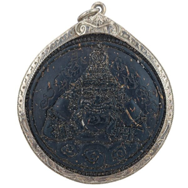 Twin one eye coconut shell rahu in silver frame by puu lersi pong