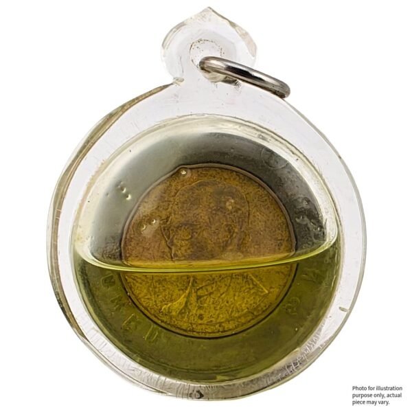 Rian Bak Pee — A Wealth Corpse Coin Infused with 6 Phi Tai Hong Nam Man Prai by Ajarn Yod - face view