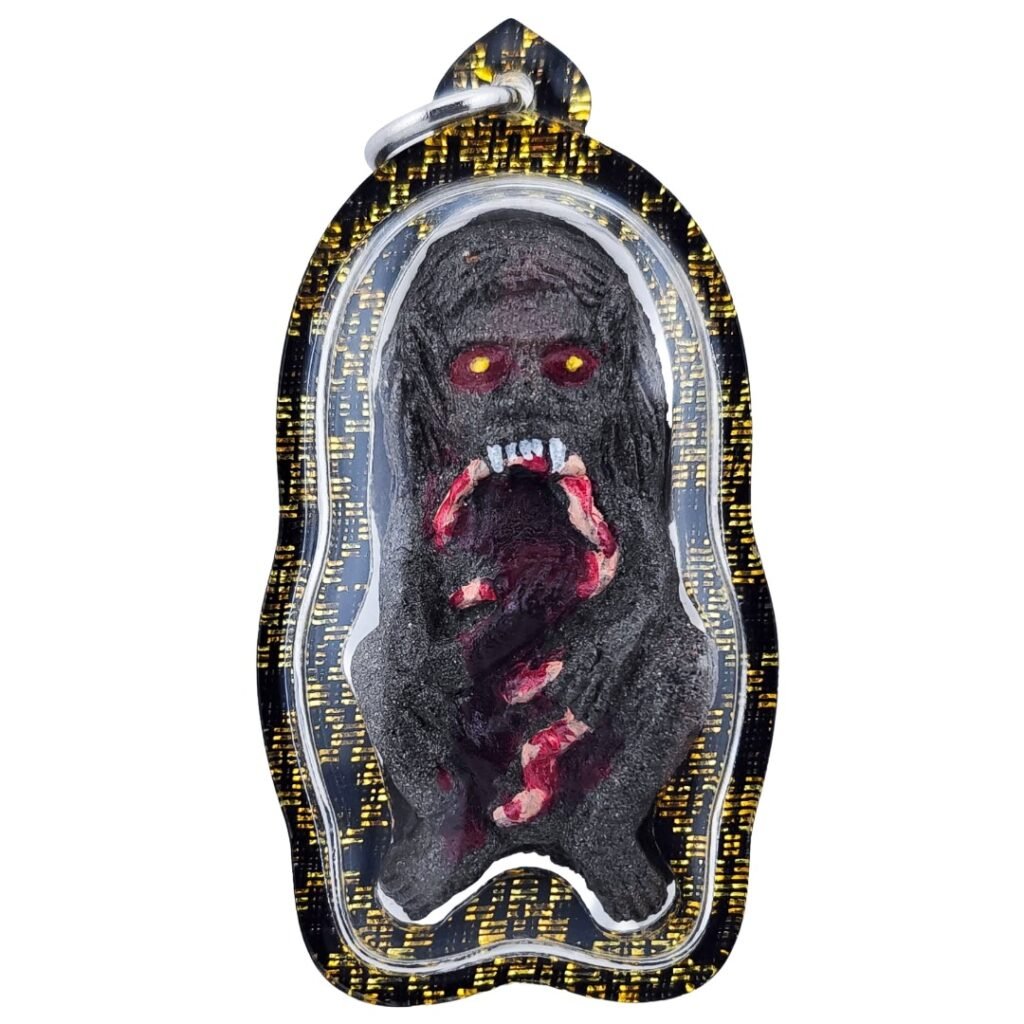 Hakom Phi Phong amulet front view showing black ghoul figure with red detailing and protective waterproof casing