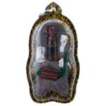 Hakom Phi Phong amulet back view with sacred materials, takrut, and nam man prai sealed inside waterproof casing