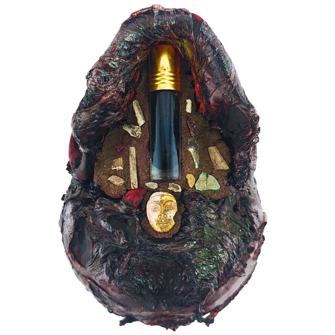 Ritual Prai Skull underside showing visible core materials, Nam Man Prai bottle, pong prai, gradook and panneng.