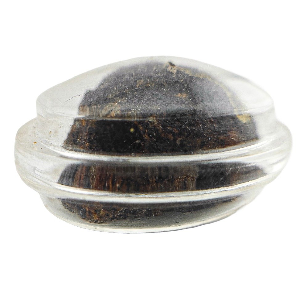 Prai Kasip Gradook Khaen sealed amulet casing showing the hidden material structure inside