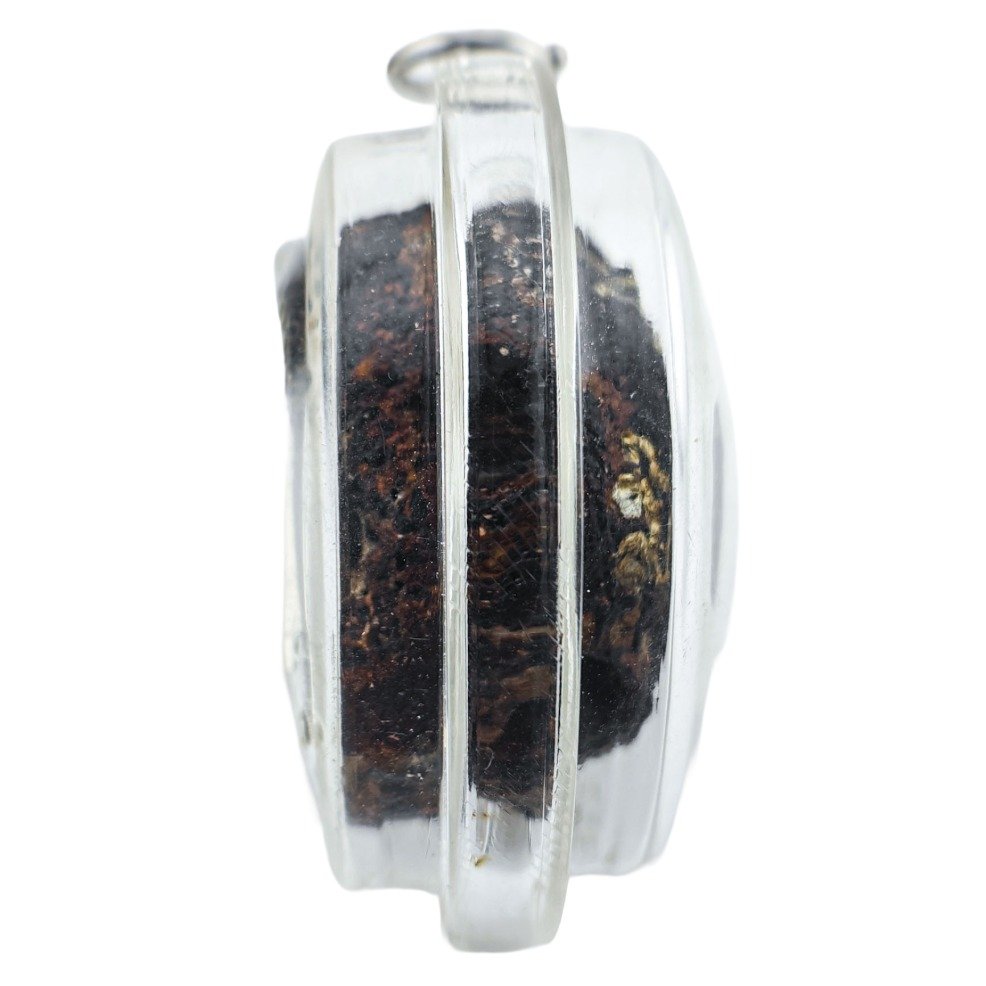 Prai Kasip Gradook Khaen low profile Thai amulet side view with sealed Gradook Khaen material