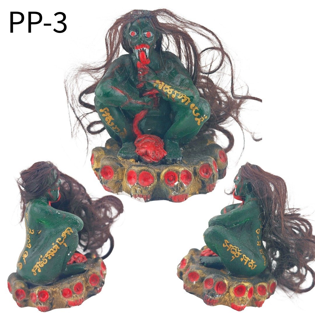 Front and side views of Phi Pong Bucha PP-3, showing its green body, red facial details, long hair and skull base.