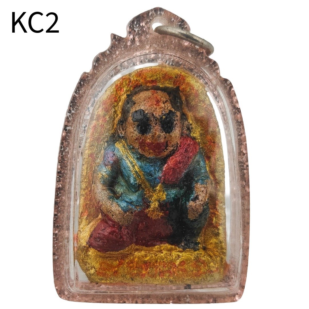 Front view of the Khun Chang wealth amulet by Ajarn Wanchai, estimated BE 2554, in its original waterproof casing.