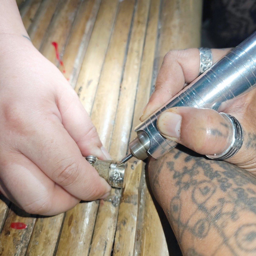Phu Lersi Pong hand-yanting the real silver casing around the old Bird’s Golden Pillow talisman