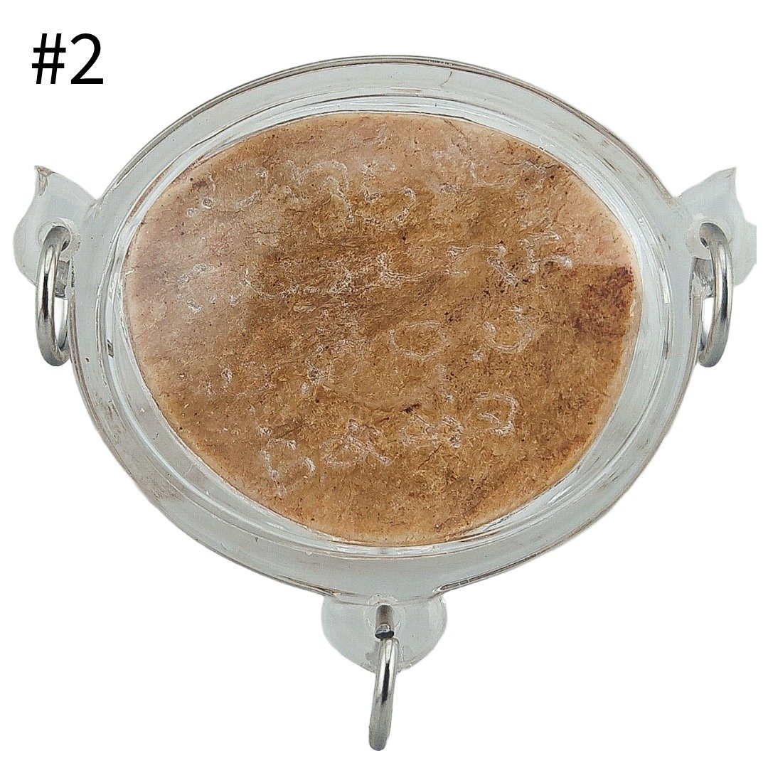 Back of Mae Kali Fresh Panneng Amulet Piece #2 showing hand-engraved sacred yants on fresh panneng