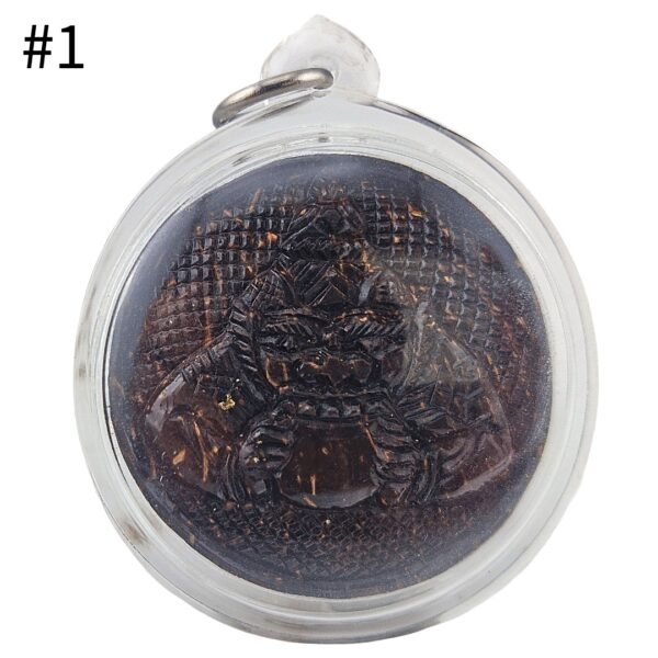Front view of Phra Rahu one-eye coconut amulet #1 by Phu Lersi Pong