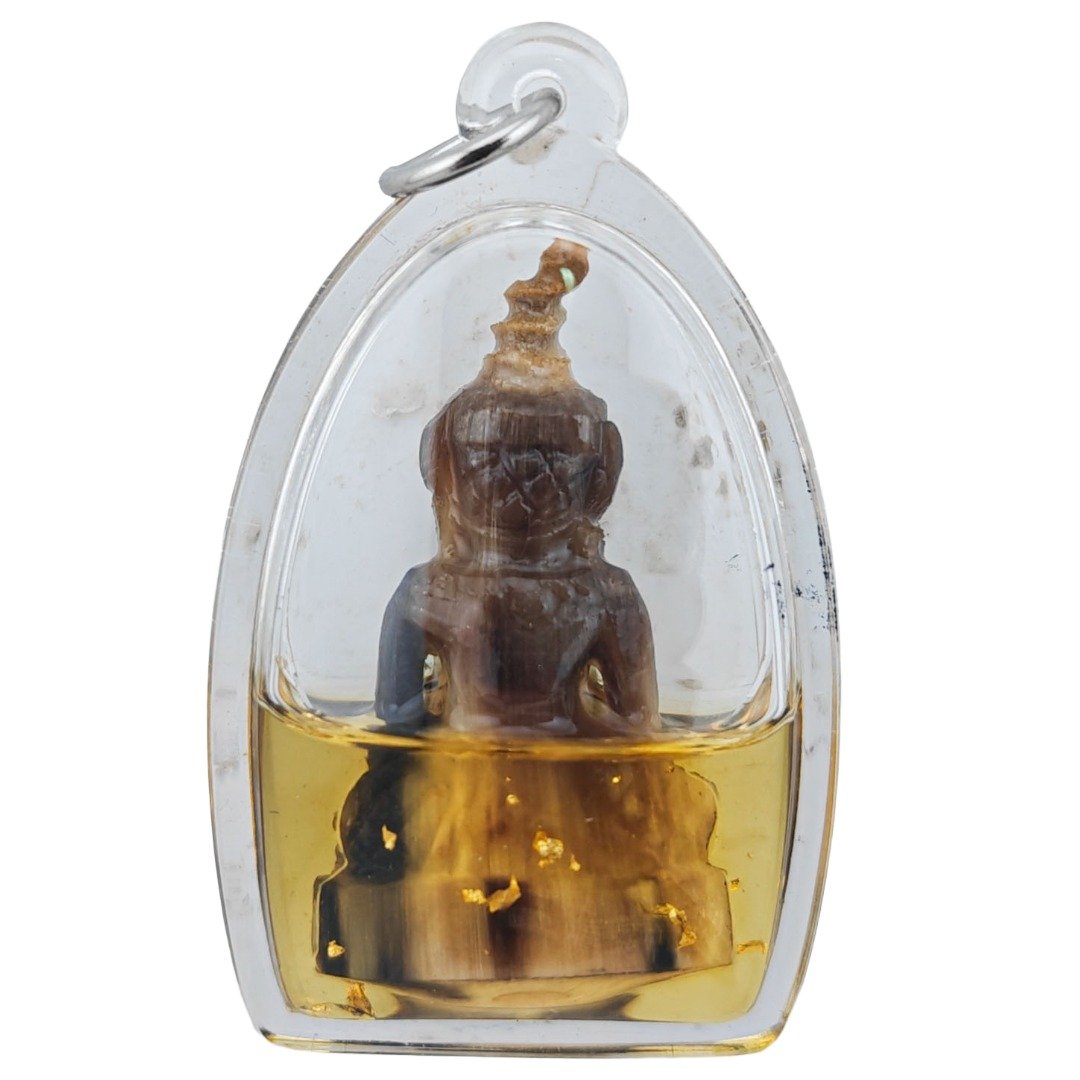 Back view of Khao Kwai Faa Pha Ngan with Nam Man Thong Kam Golden Oil visible inside the casing