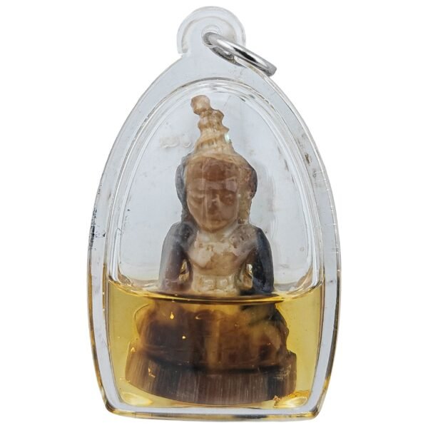 Front view of the lightning struck buffalo horn Ngan with Nam Man Thong Kam Golden Oil and gold flakes inside the casing