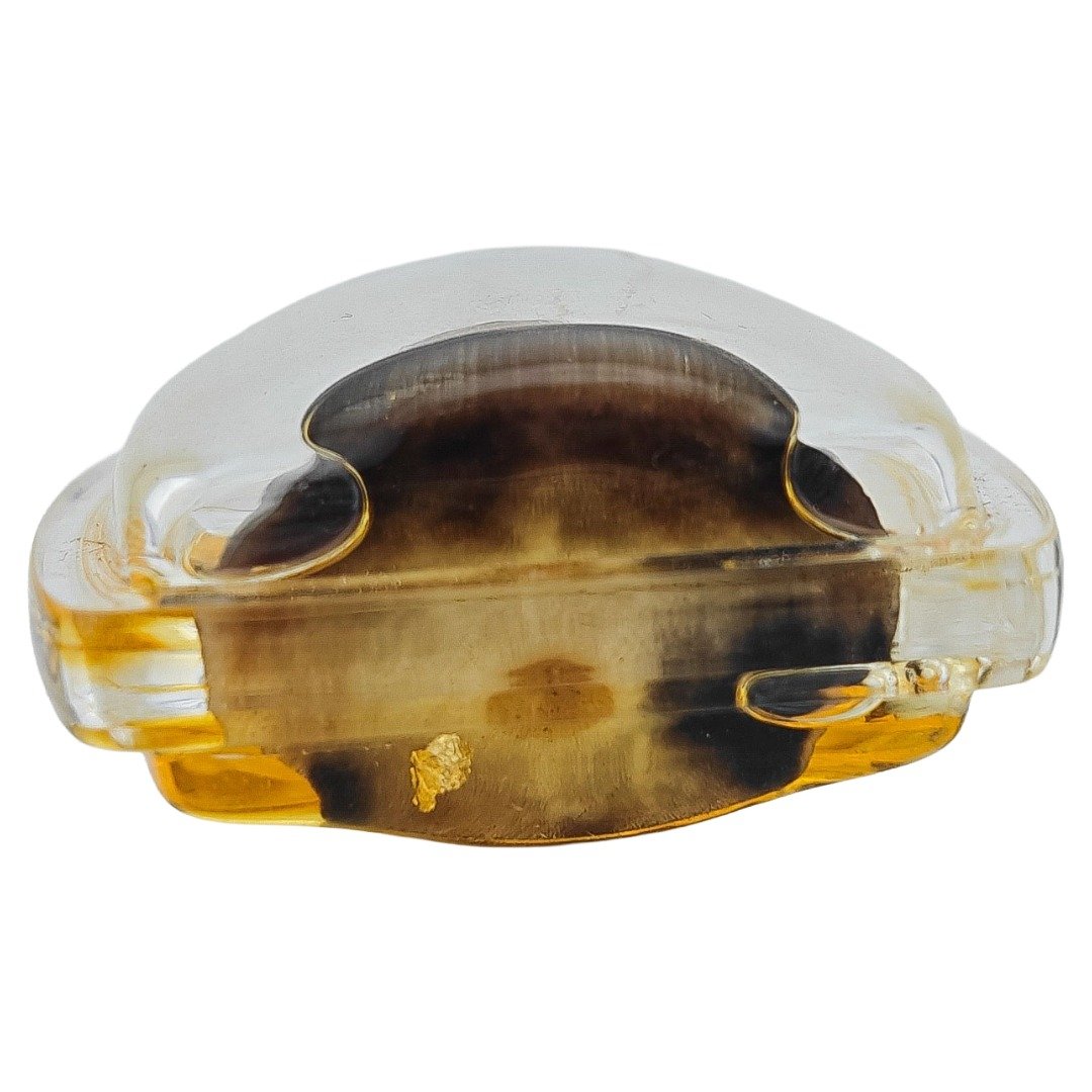 Base view of the lightning struck buffalo horn Ngan showing the natural horn grain inside the casing