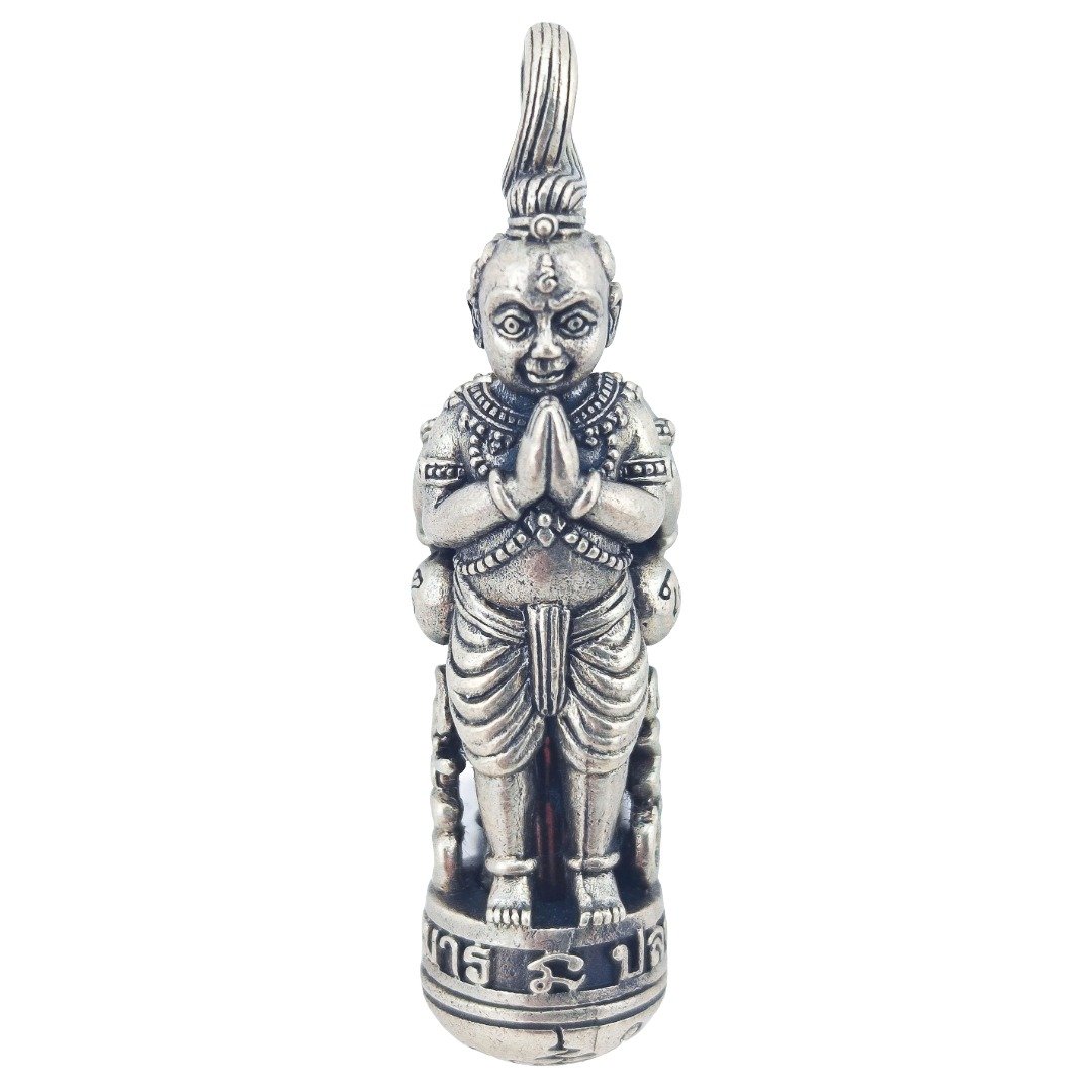 Front view of the praying Kumantong with hands together on the BE 2556 debt-clearing takrut.