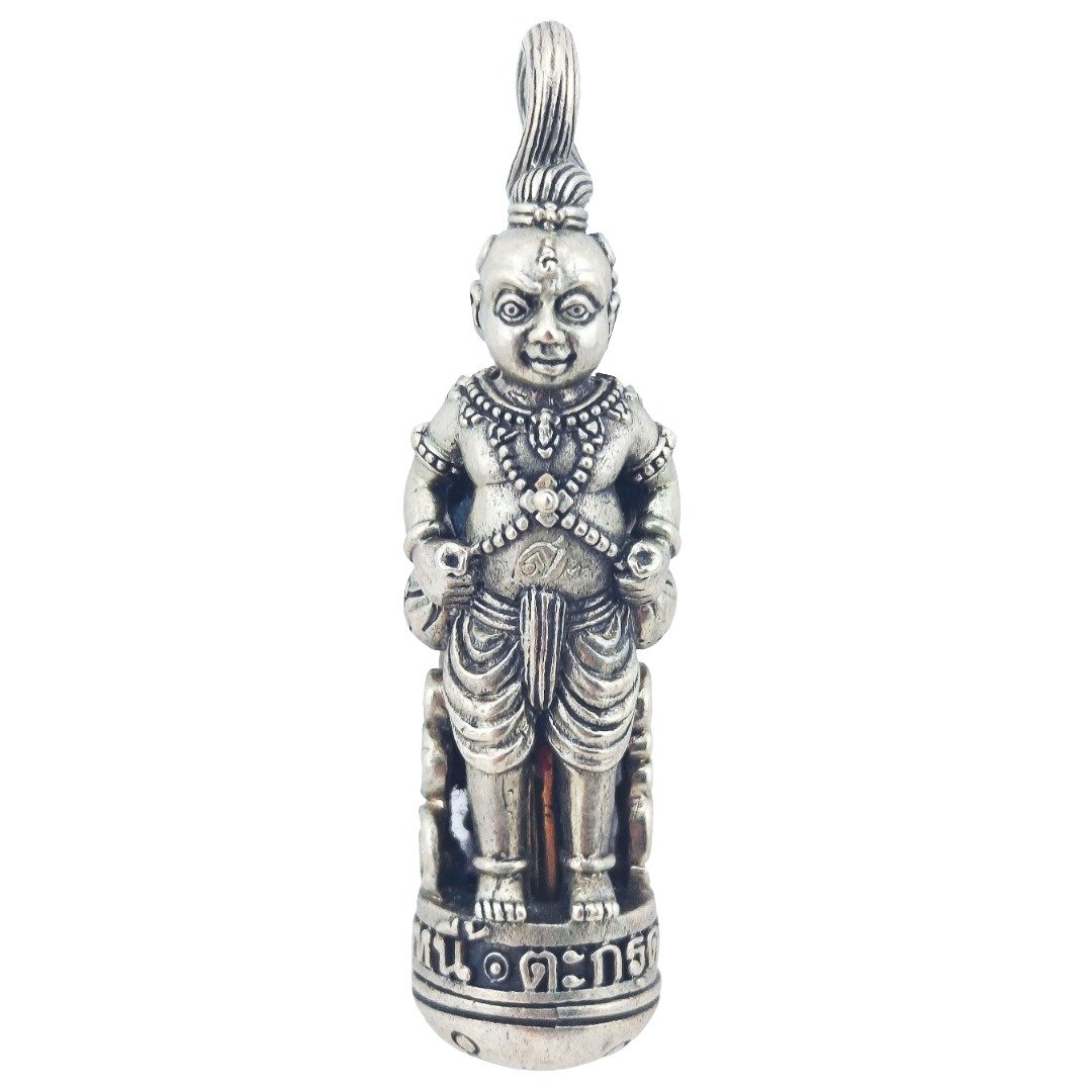 Front view of the standing Kumantong with fists near his waist on Ajarn Subin's Nuer Nickel takrut.