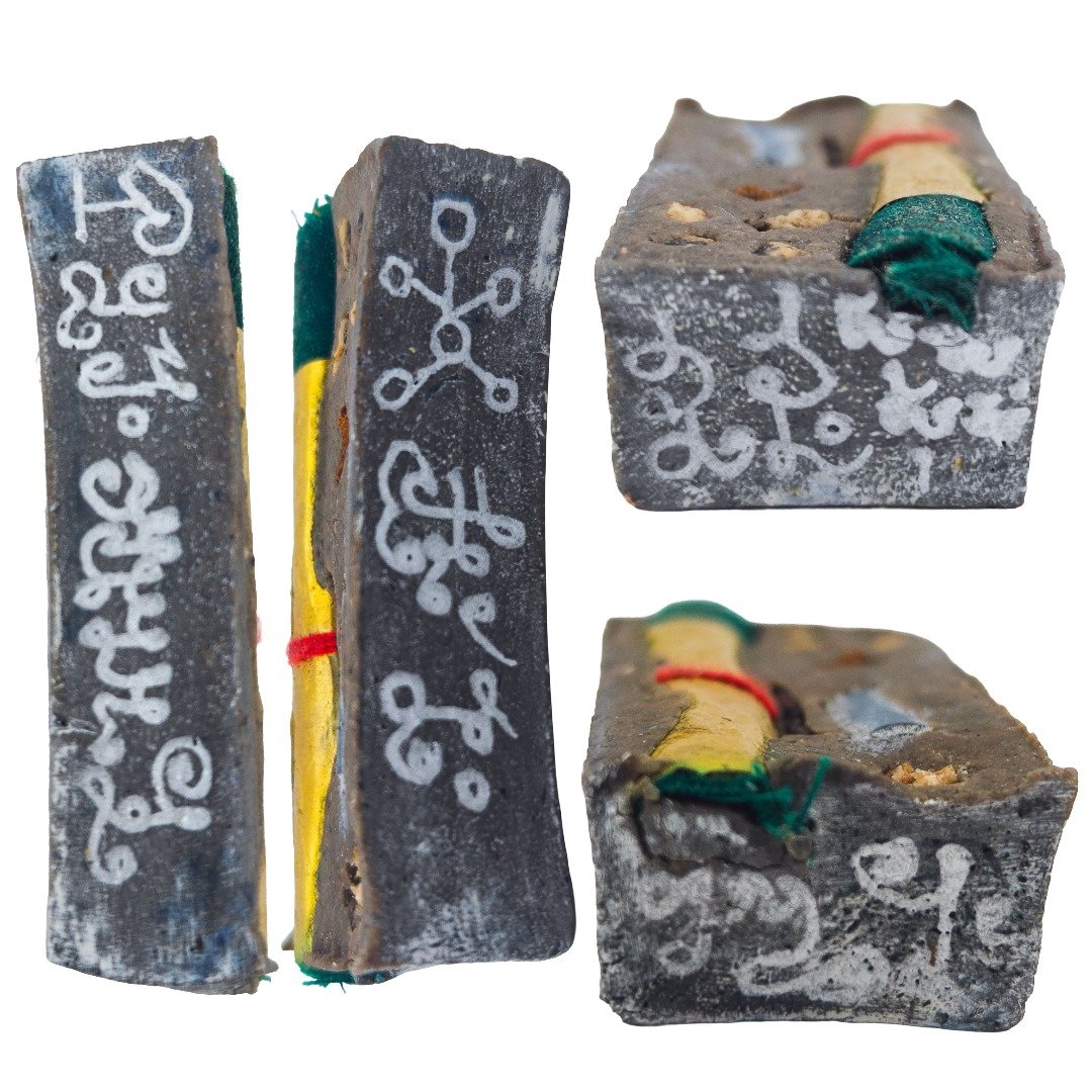 Close-up views of the Mao Shan Vampire Coffin murn sarn showing handwritten Thai yants and Mao Shan hua zi markings.