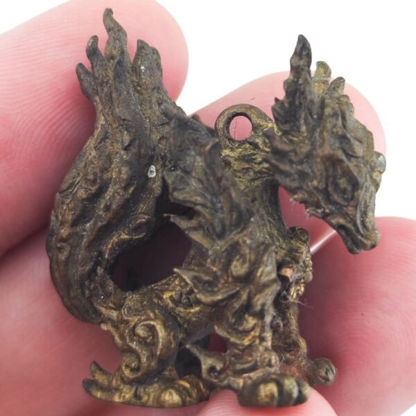 Nine-Tail Fox Samrit amulet by Ajarn Wut showing its detailed face, tails and hanging loop