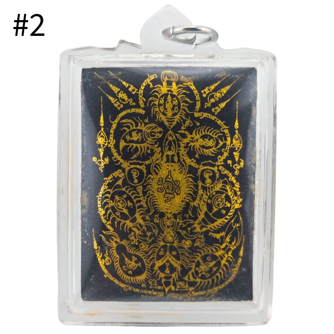 Phu Lersi Pong Tamlar Eating Bug Locket BE 2568 piece 2 featuring gold yantra artwork on a black background.