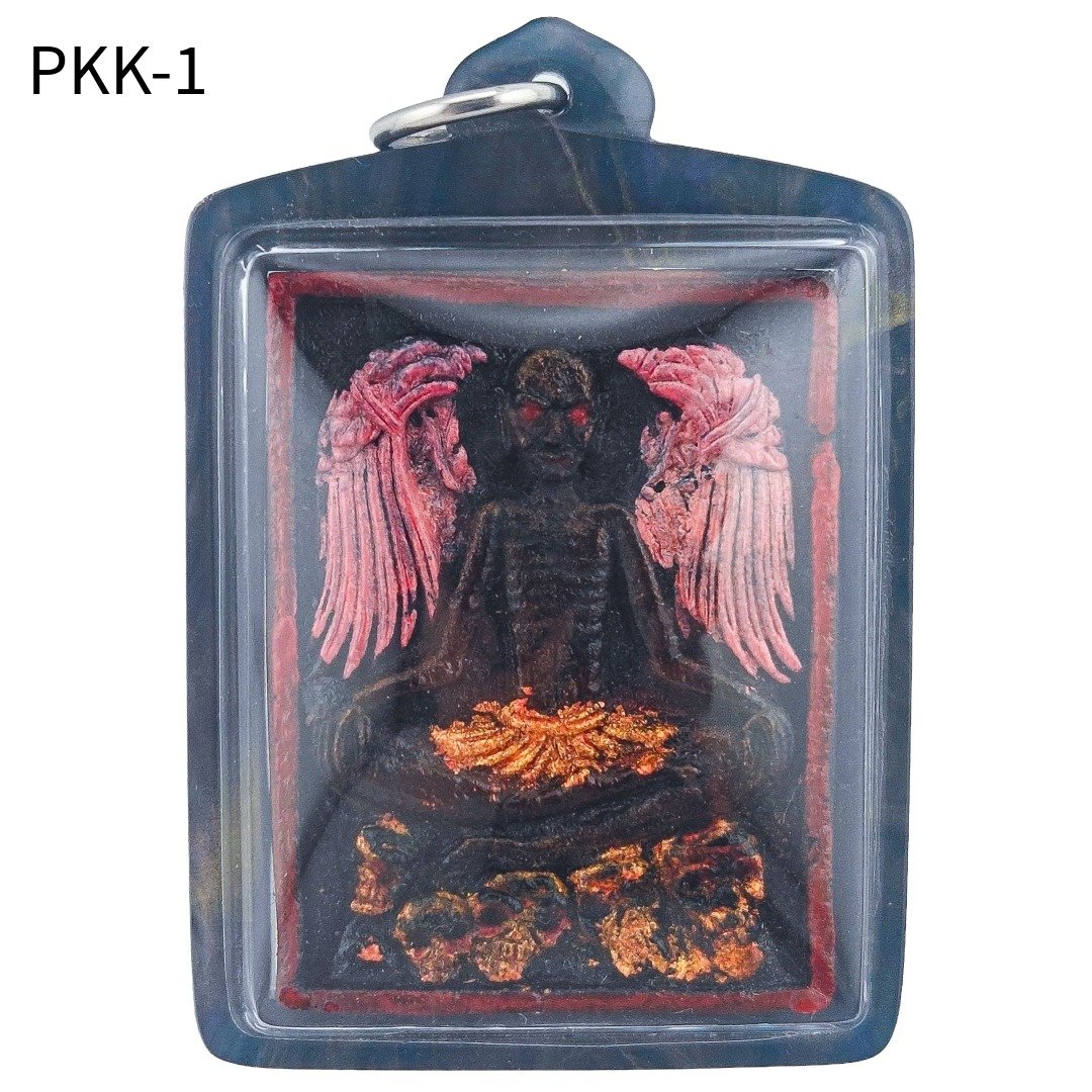 Front of Ajarn Wut's BE 2565 Lersi Pu Kai Kaew amulet with dark skeletal body, red eyes, pink wings and gold details above skulls.