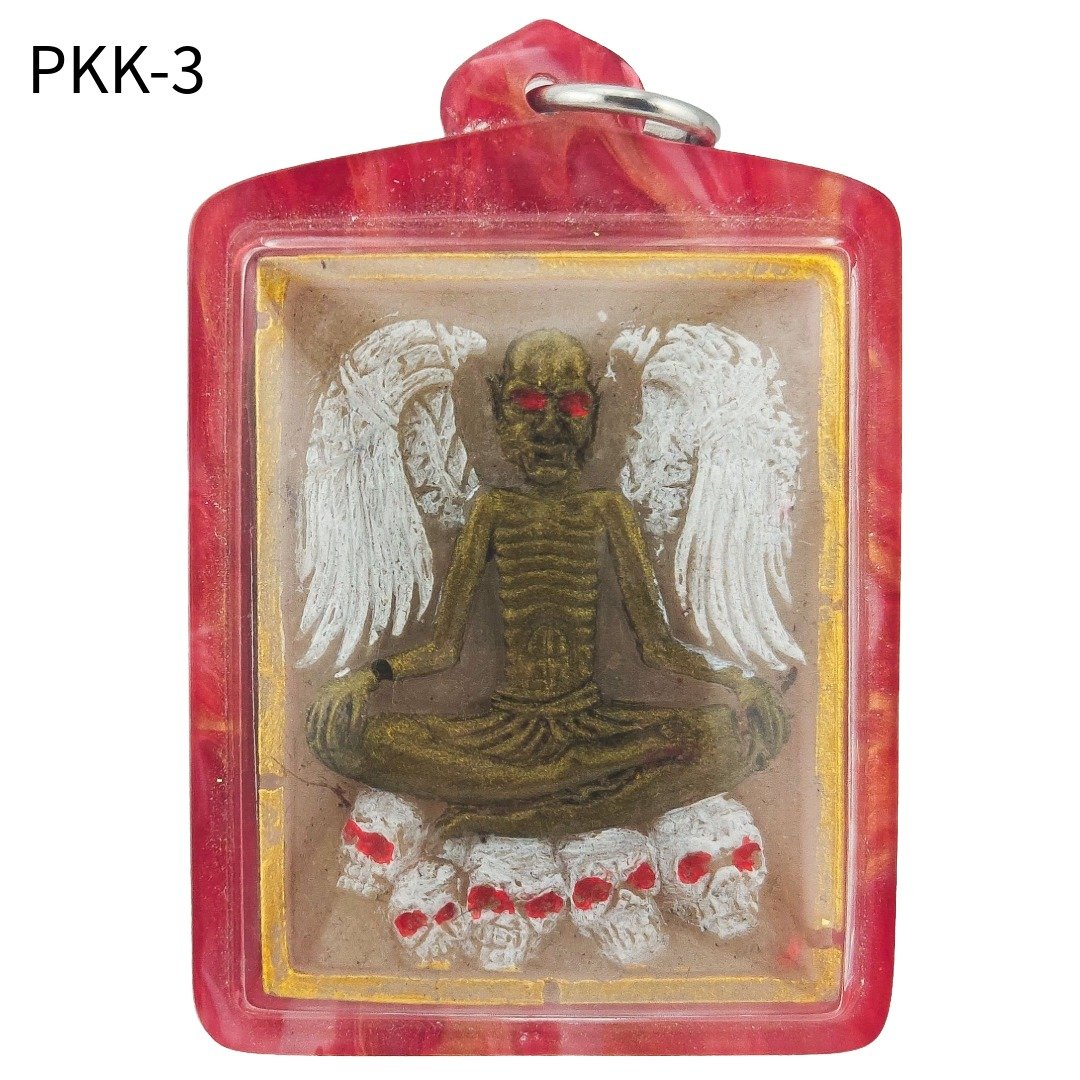 Front of Ajarn Wut's BE 2565 Lersi Pu Kai Kaew amulet with red eyes, skeletal body, white wings and skulls in red casing.