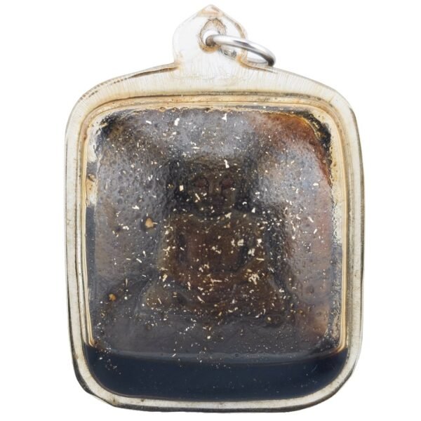 Ajarn Tay Panneng Ngan front showing the whole carved panneng beneath its aged amber casing.
