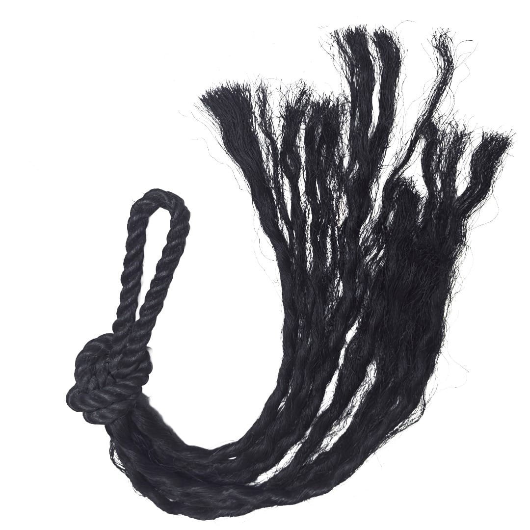Side view of Ajarn Kitkamo's Prai Command Whip showing the looped handle, thick rope knot and loose black strands.