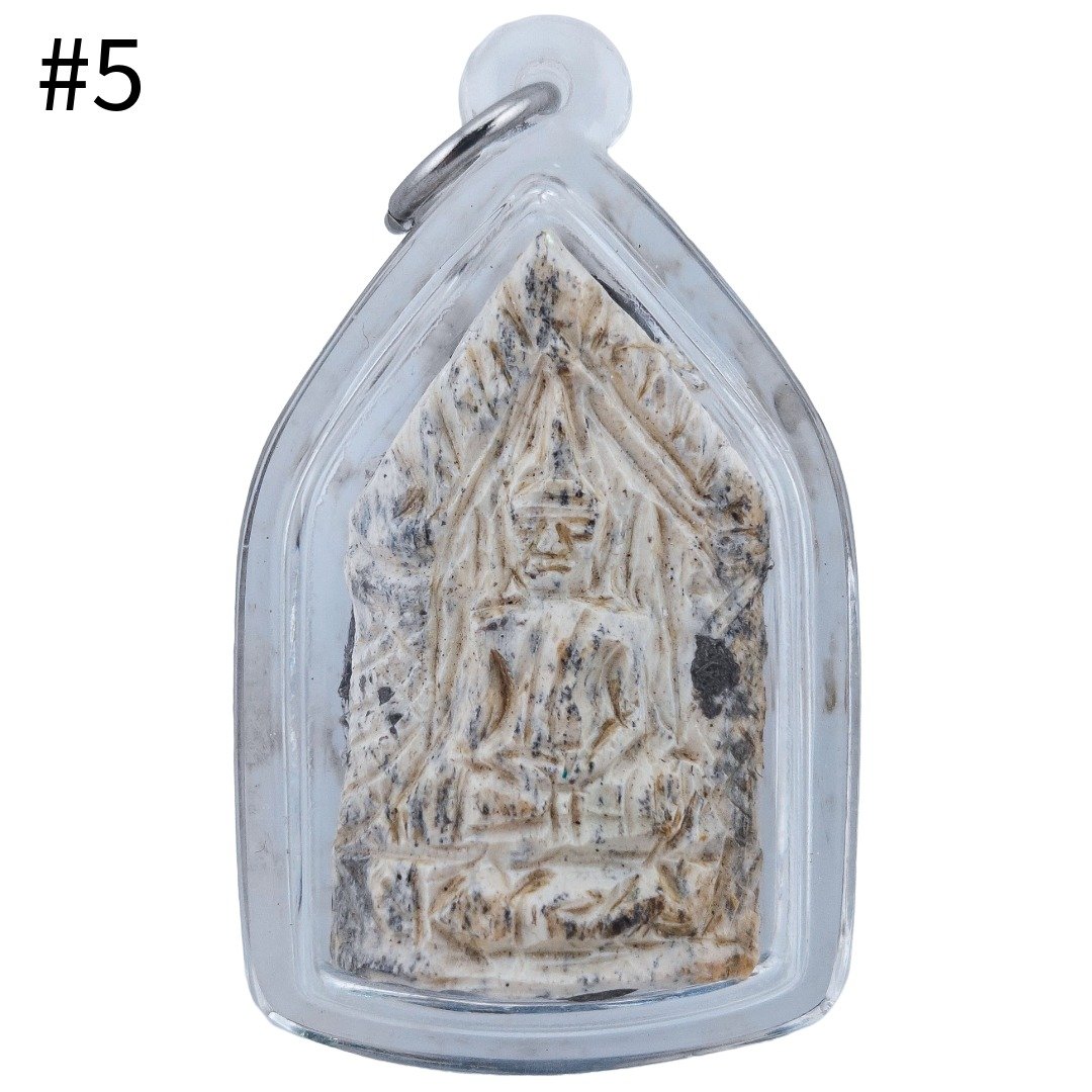 Front of Gradook Prai Khun Paen piece 5 showing a seated Khun Paen figure in pale textured material inside a clear pendant casing
